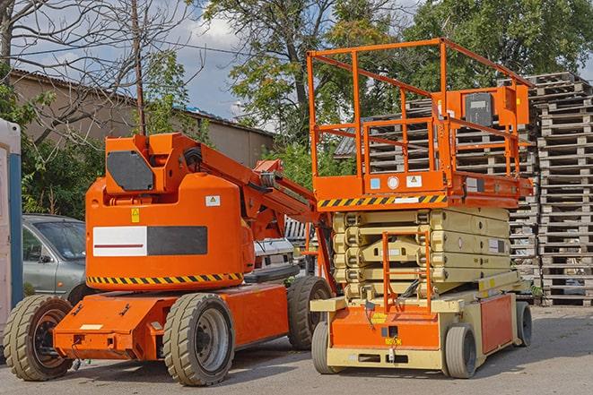 heavy-duty forklift maneuvering through a busy warehouse in Farmersville